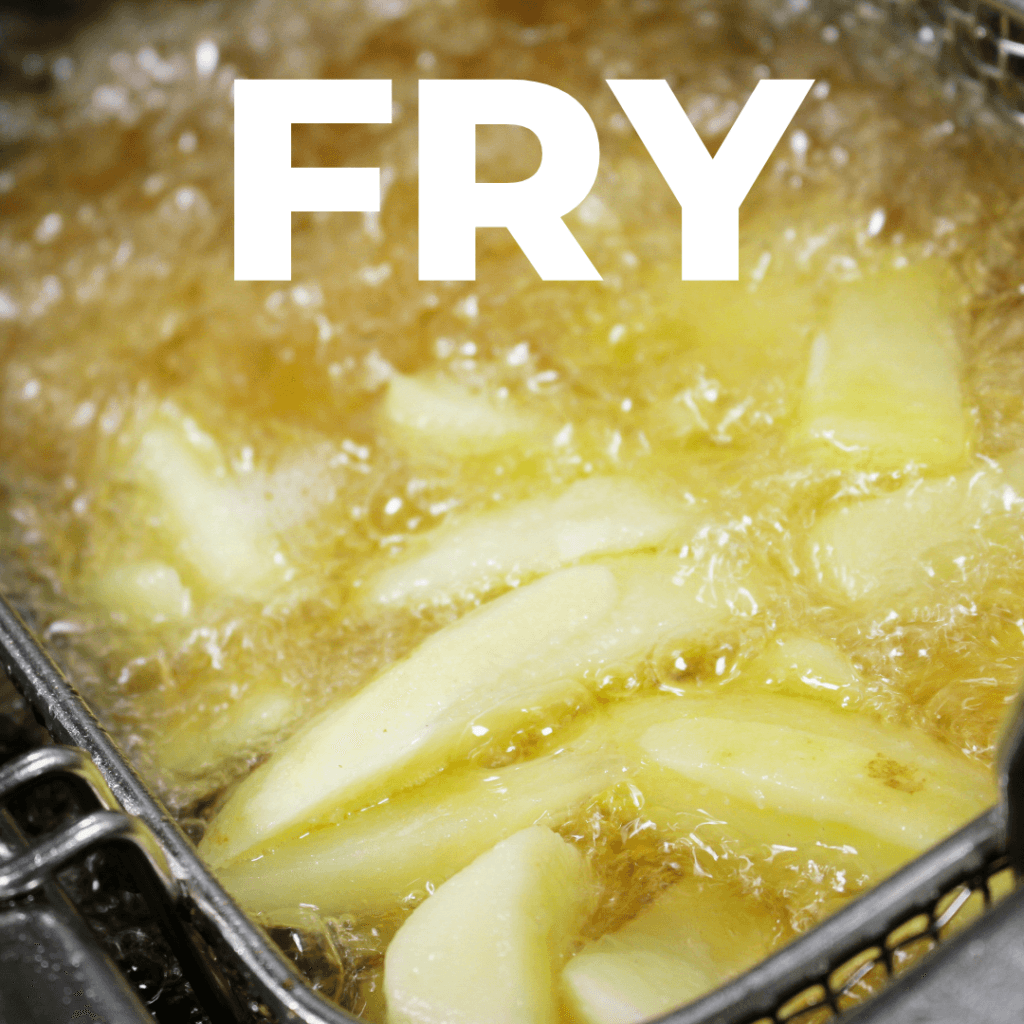 Vegetables being fried in vegetable oil