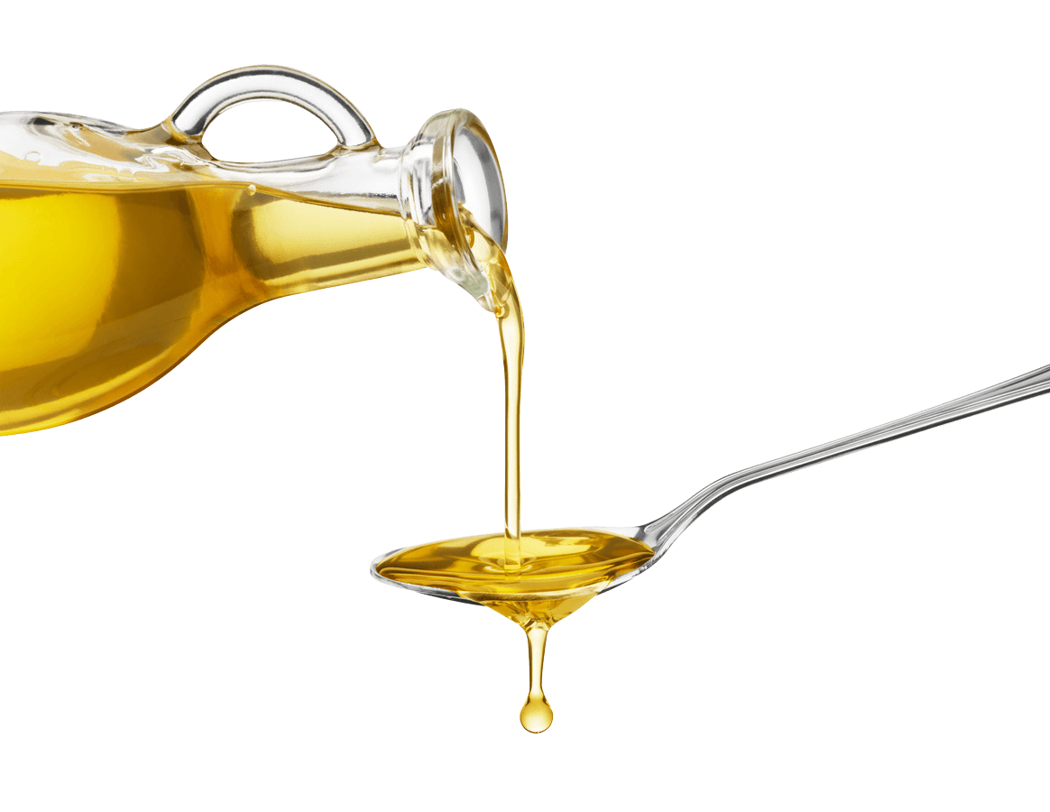 Golden Vegetable Oil Being Poured to show the use of vegetable oil in kitchens